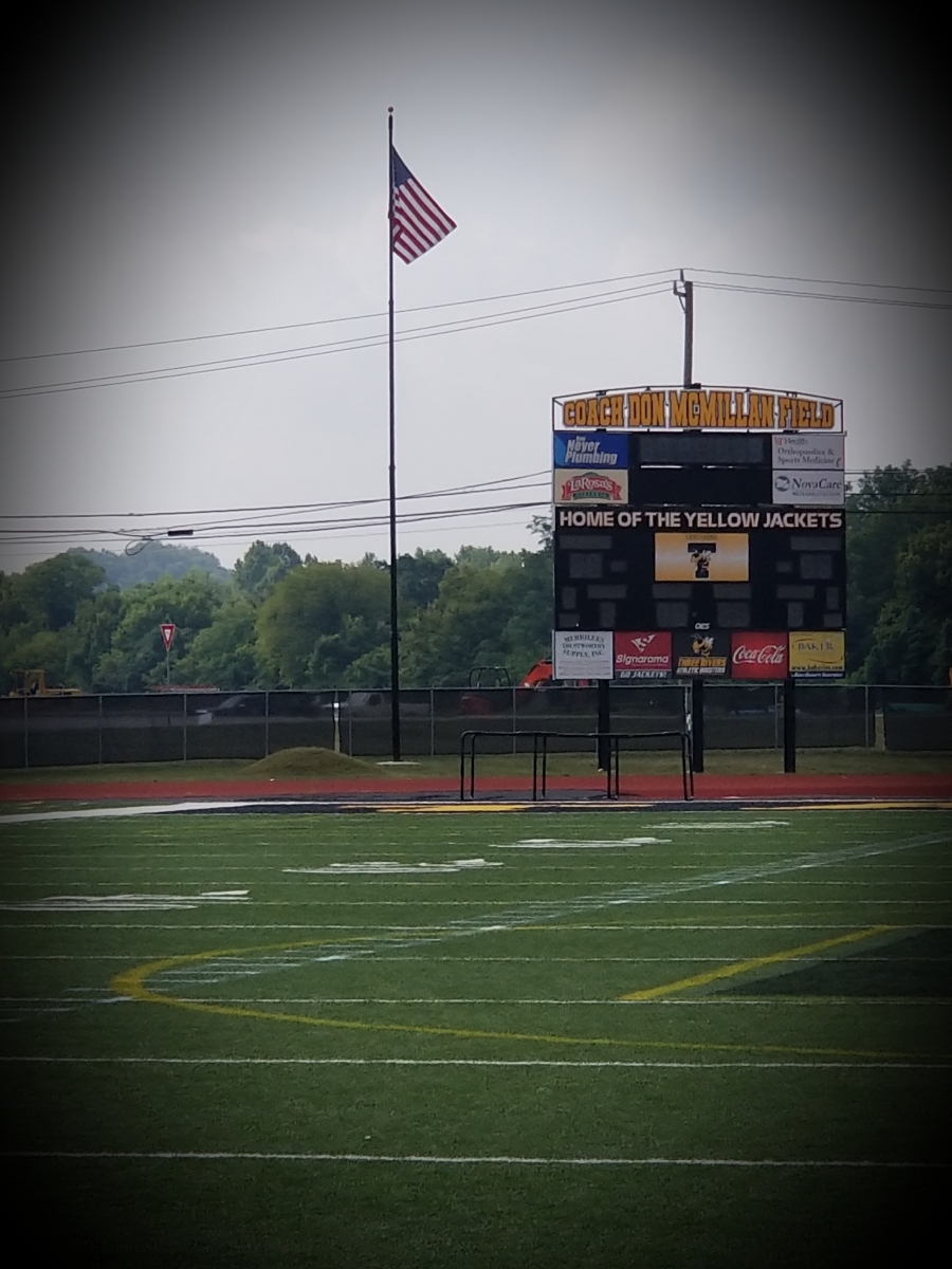 Don McMillan Field sign for naming of the Taylor Football Turf